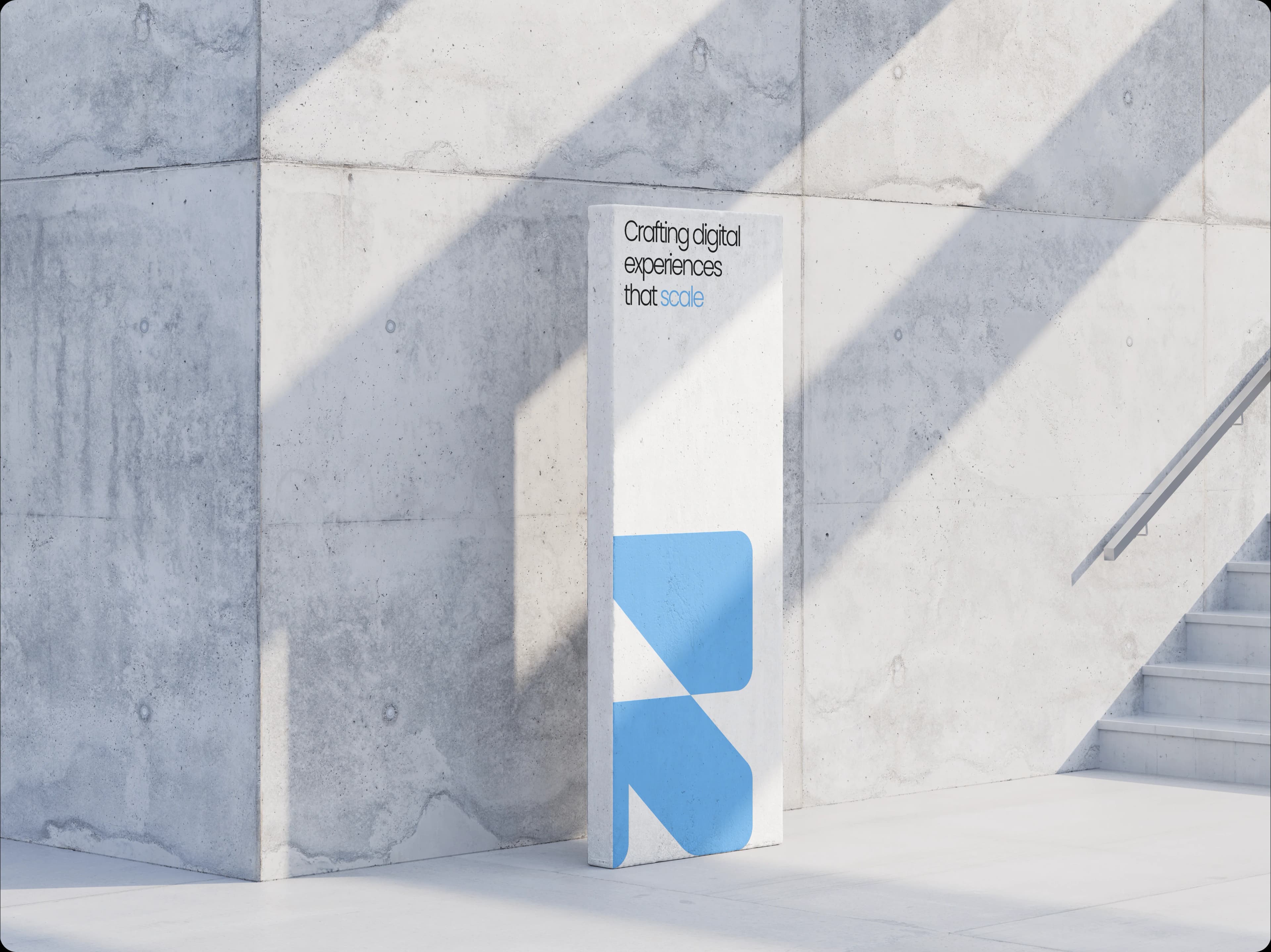 White brand pylon against a concrete facade with Replace. claim